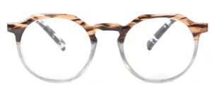 Milano - Läsglasögon är runda glasögon med sköldpaddsmönster på den övre halvan av bågen och skalmarna, med klart material på den nedre halvan, mot en vit bakgrund.